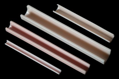 Photograph of straight wire / edge covers (ceramic half tubes)
